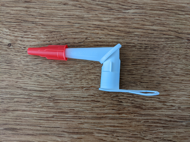 Foto van een draaibaar hulpstuk voor kitspuit